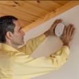 Parent installing new smoke detector